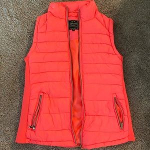 Bright pink vest with removable lining/hood